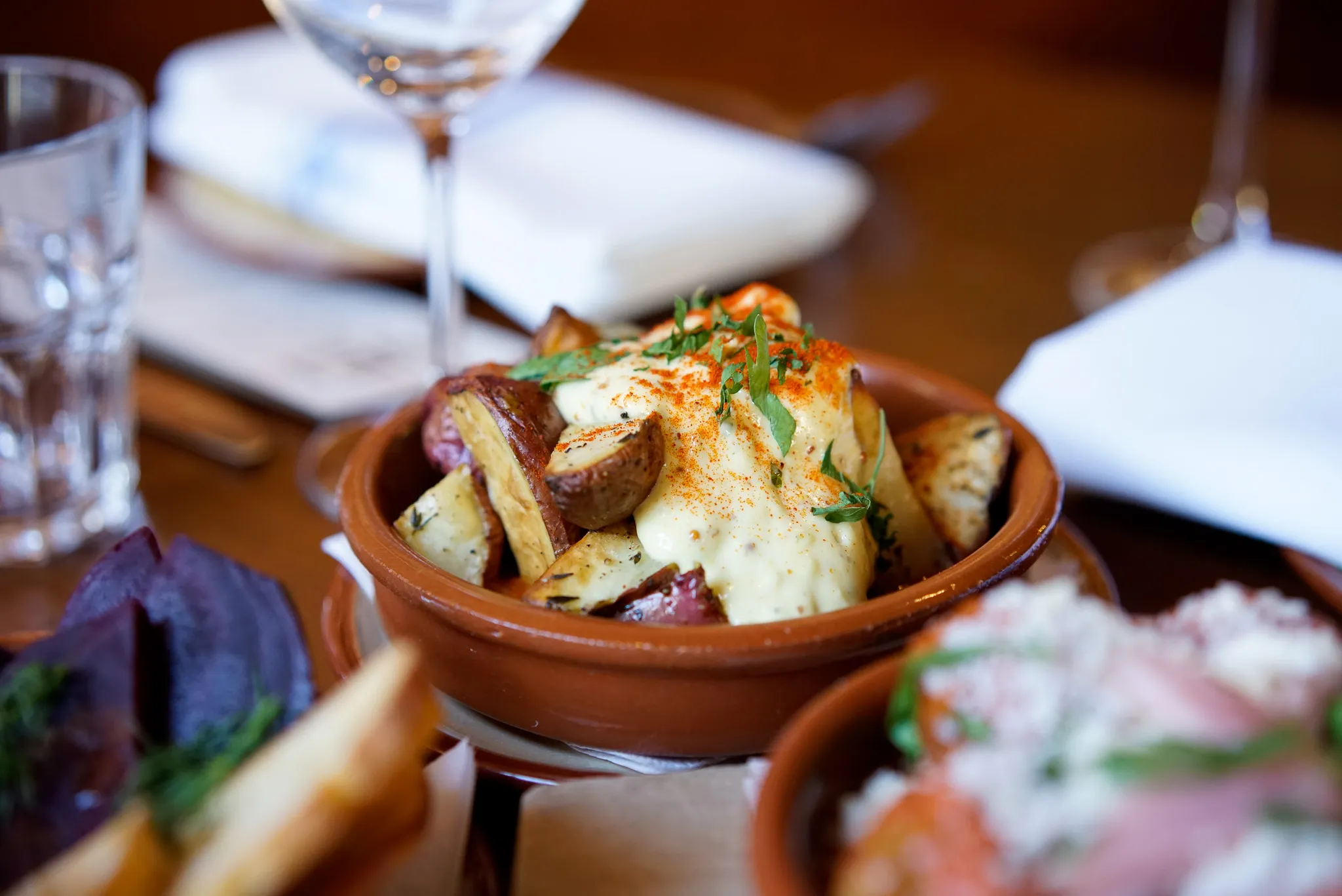 Patatas bravas at Perro Negro Taperia, with smoked paprika and house alioli
